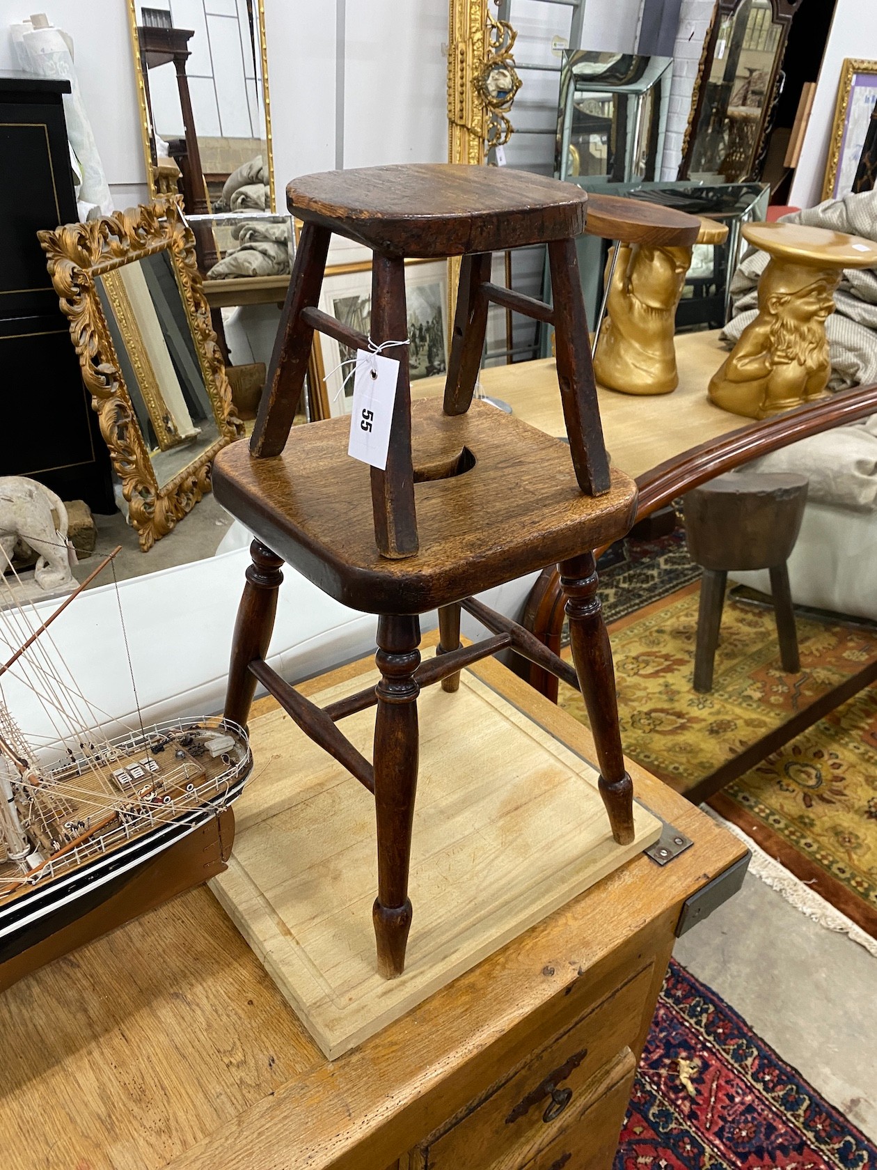 Two 19th century mahogany and fruitwood stools, larger width 28cm, height 38cm